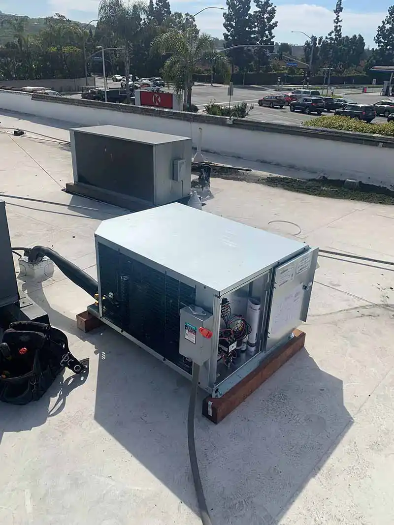 Professional electrician with tools ready for commercial electrical service