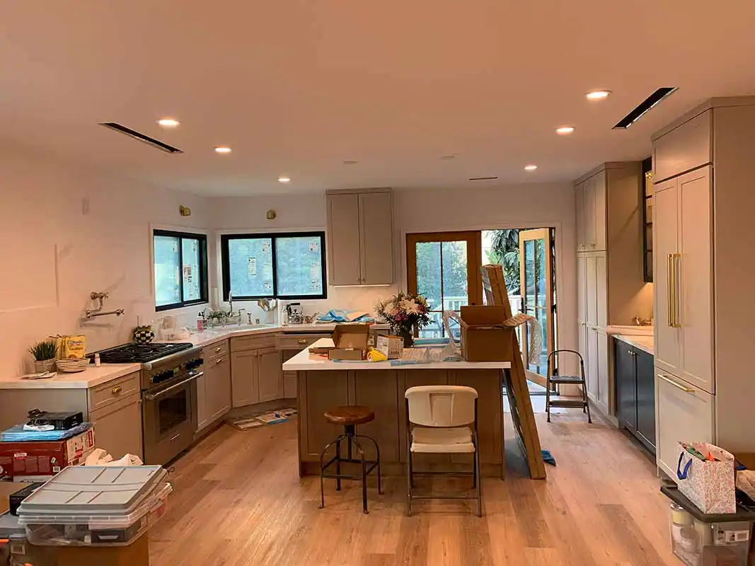 High-end kitchen renovation lighting trim-out with recessed fixtures in Los Angeles