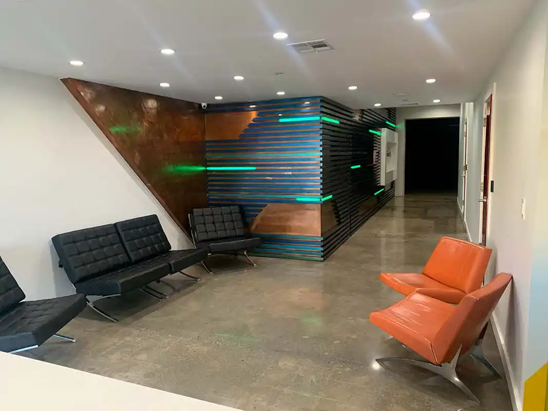 Modern office lobby architectural lighting design by commercial electrician in SoCal