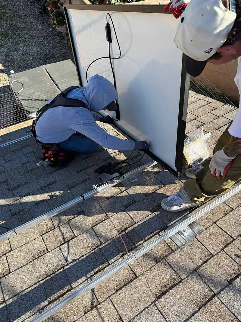 Licensed electrician completing a residential electrical panel installation in Southern California